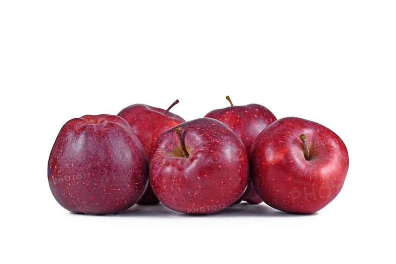 Many red apple fruits on white background