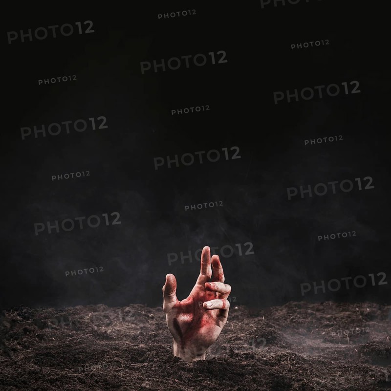 Hand protruding ground