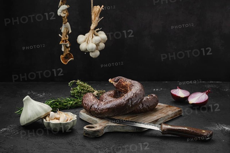 Organic blood pudding on cutting board