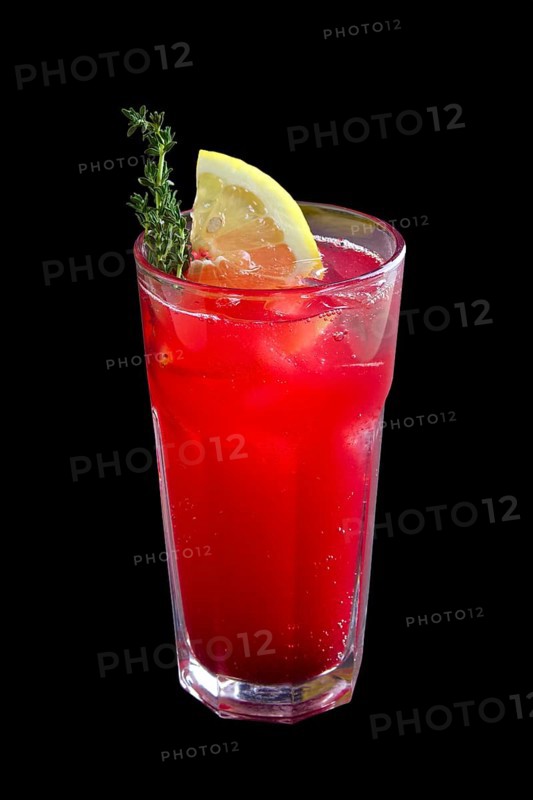 Glass of cranberry and lemon lemonade isolated on black