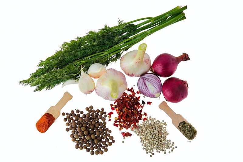 Tot view of set of spice and herbs for everyday cooking isolated on white
