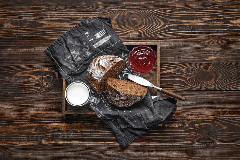 Fresh rye brown bread on wooden cutting board