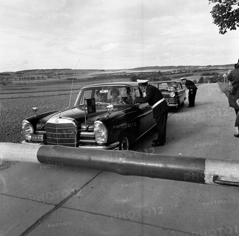 Government representatives with their vehicles in 1966 during a police check at the hitherto secret atomic bunker of the Federal Government in the Ahr valley