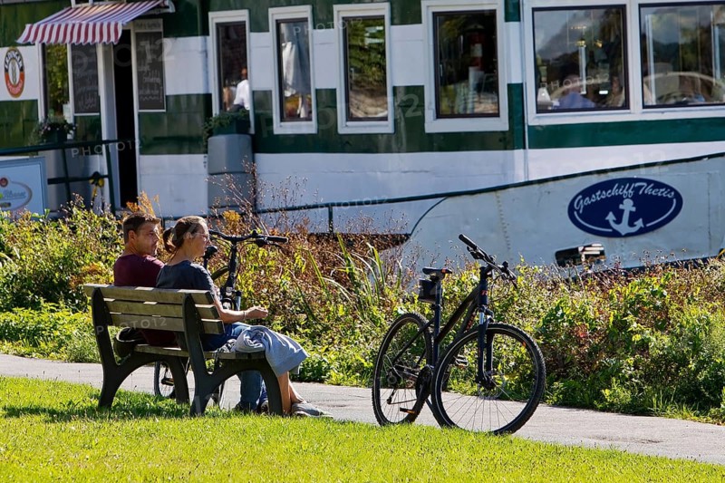 Bicycle rider at the restaurant ship Thetis