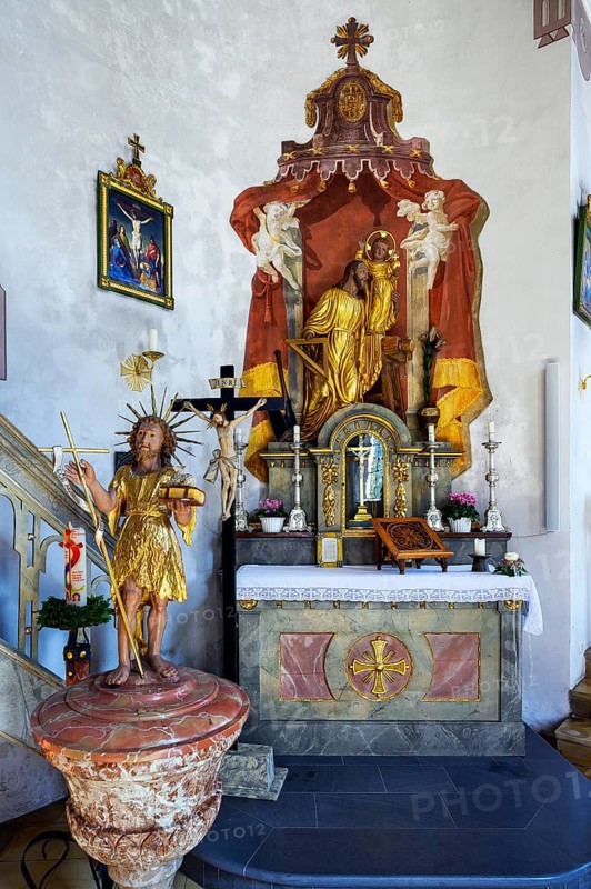 Side altar with baptismal font