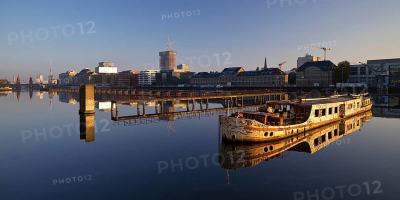 Shipwreck of the MS Dr. Ingrid Wengler in the Spree in early morning light