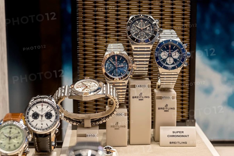 High quality watches of the luxury brand Breitling 1884 in the shop window with price tag