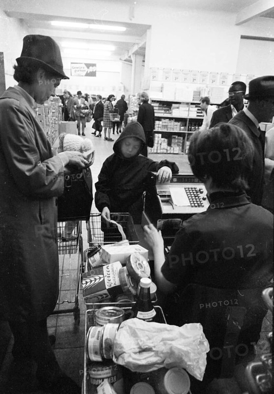 The work of a housewife and mother shopping for groceries at the supermarket and Aldi