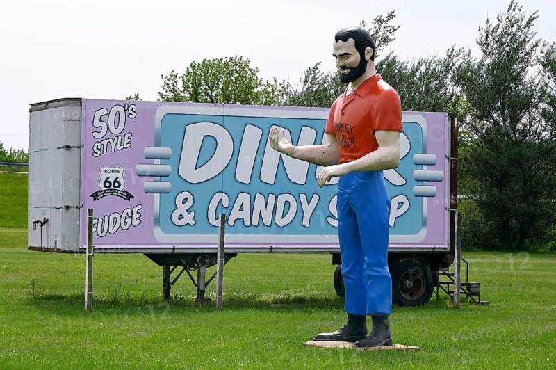 Harley Davidson man statue in front of the Pink Elephant Antique Mall