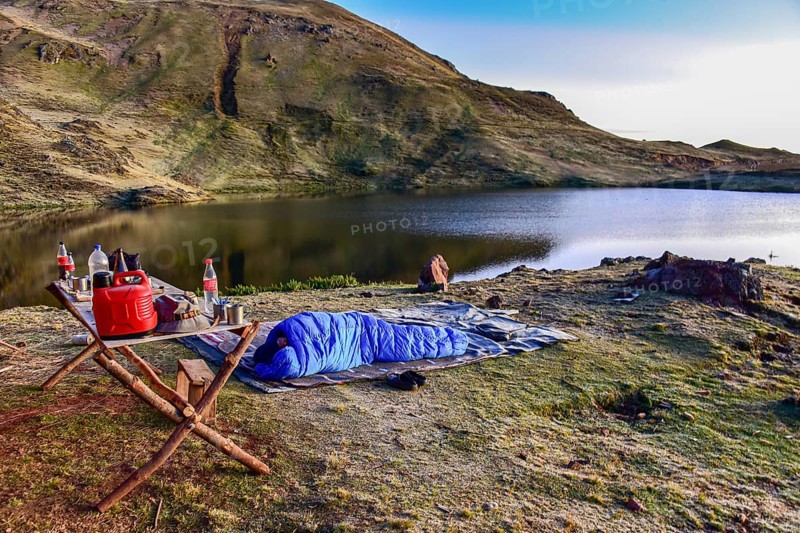 Outdoor overnight stay in a sleeping bag in the Peruvian highlands