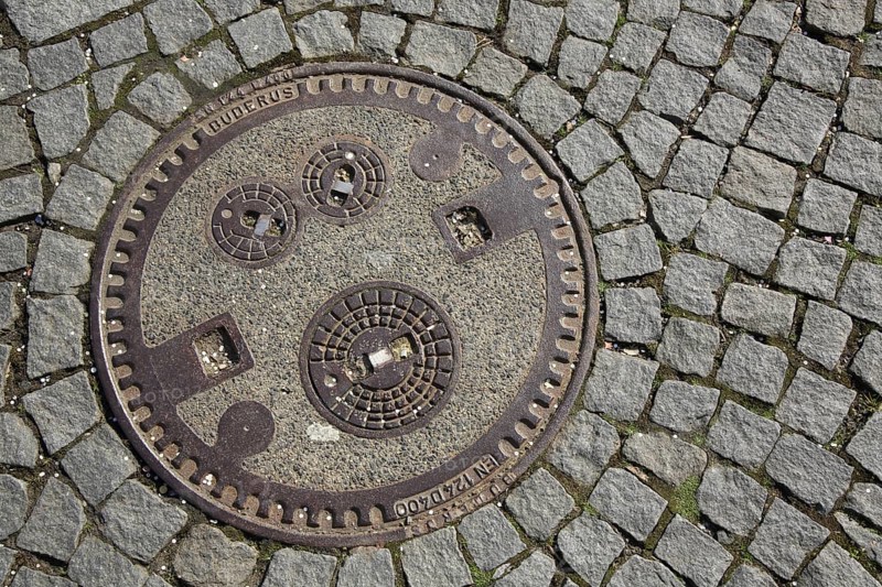 Manhole cover with enclosed three cover