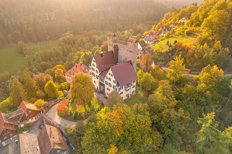 Berneck Castle in autumn at sunset
