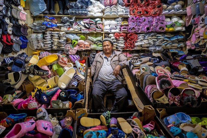Vendor of shoes in his stall