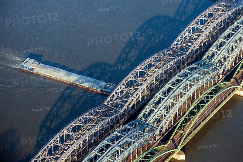 Aerial view of a barge under the Hamburg Elbe bridge