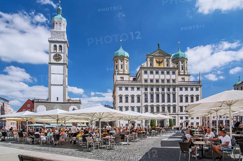 Restaurant terraces on the town hall square with Perlachturm and town hall