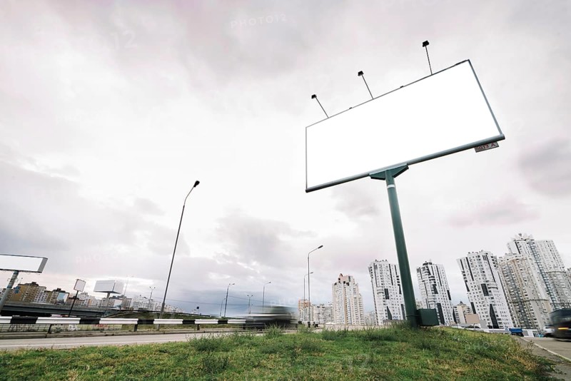 Billboard city entrance cloudy day