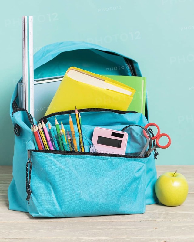Blue school bag with essential supplies