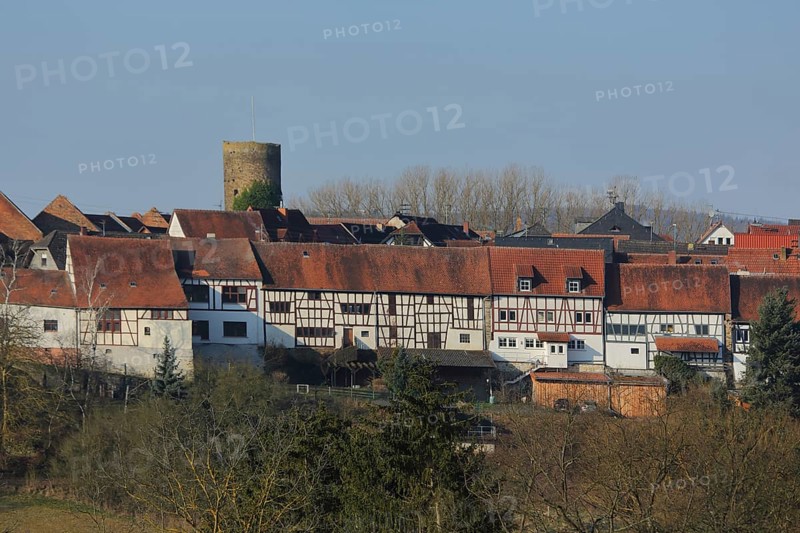 Barn front with historic Hutt tower in Walsdorf