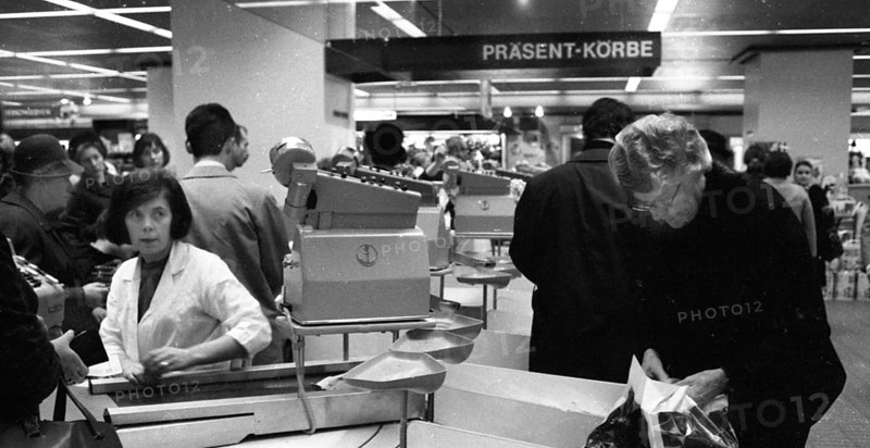 The work of a housewife and mother shopping for groceries at the supermarket and Aldi