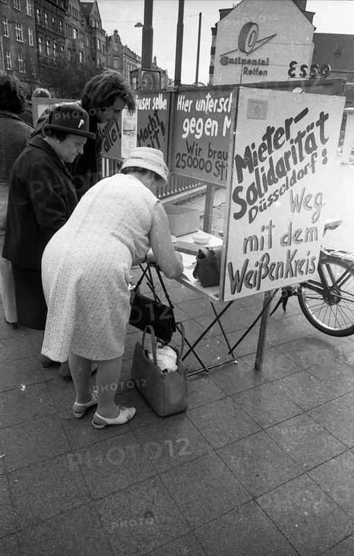 Tenants protest with a collection of signatures