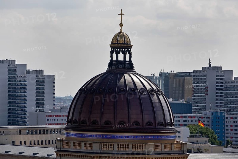 Dome of the Humboldt Forum and skyscrapers above the roofs of the city