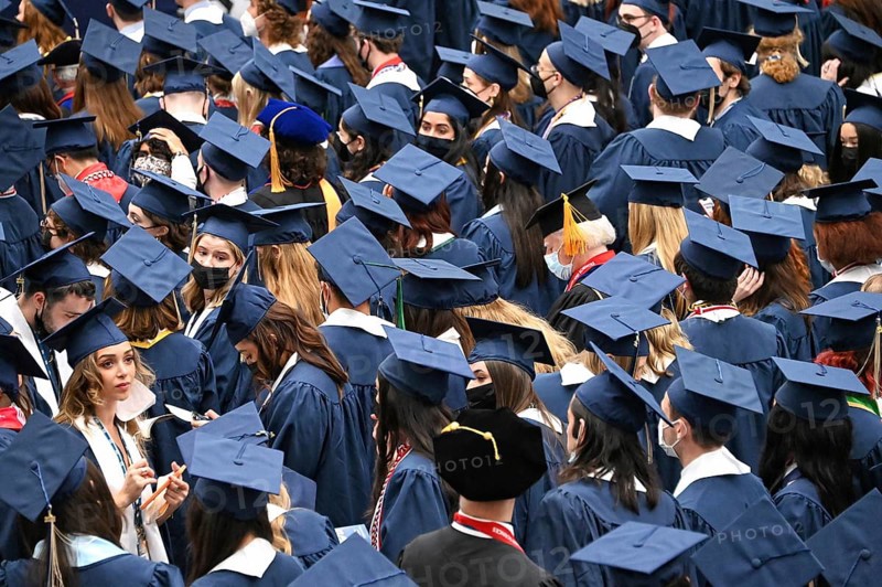 College students of George Washington University in the traditional robe and mortarboard on their graduation day