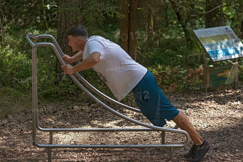Young man on a fitness course