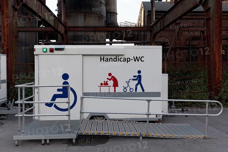 Handicap WC with pictograms for wheelchair and rollator at Piazza Metallica