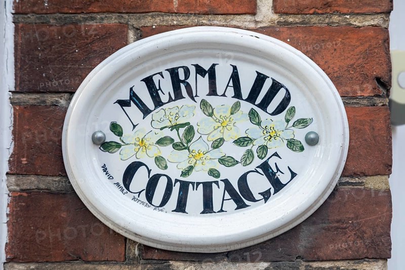 Sign with house name