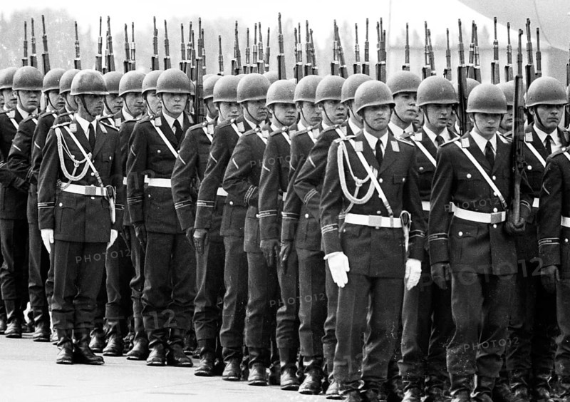 With full military honours
