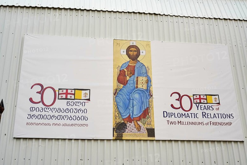 Banner next to a church in the Old City