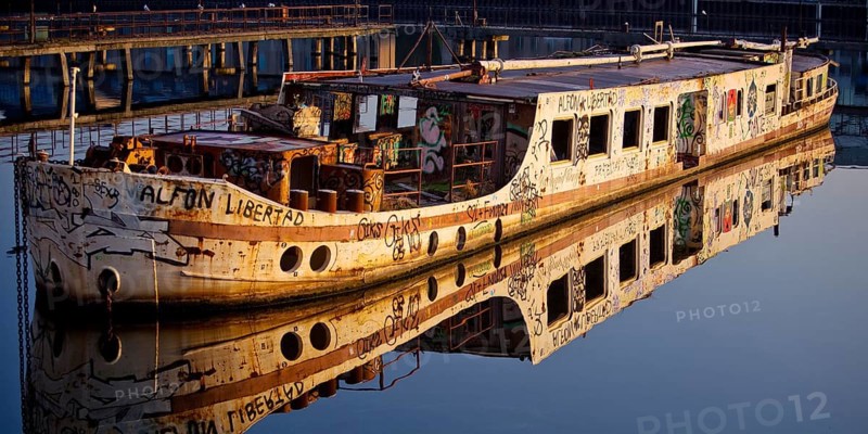Shipwreck of the MS Dr. Ingrid Wengler in the Spree in early morning light