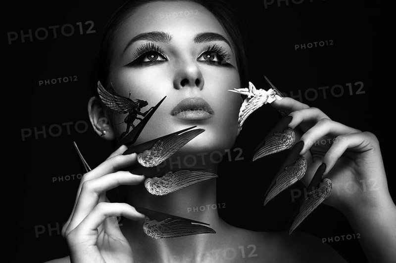 Beautiful woman with art make-up