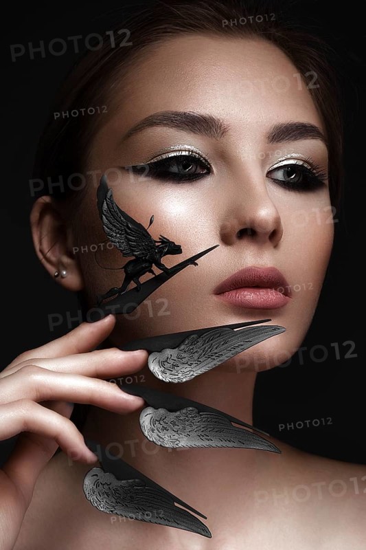Beautiful woman with art make-up