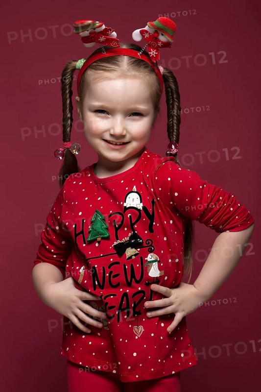Funny little girl in the New Year's image