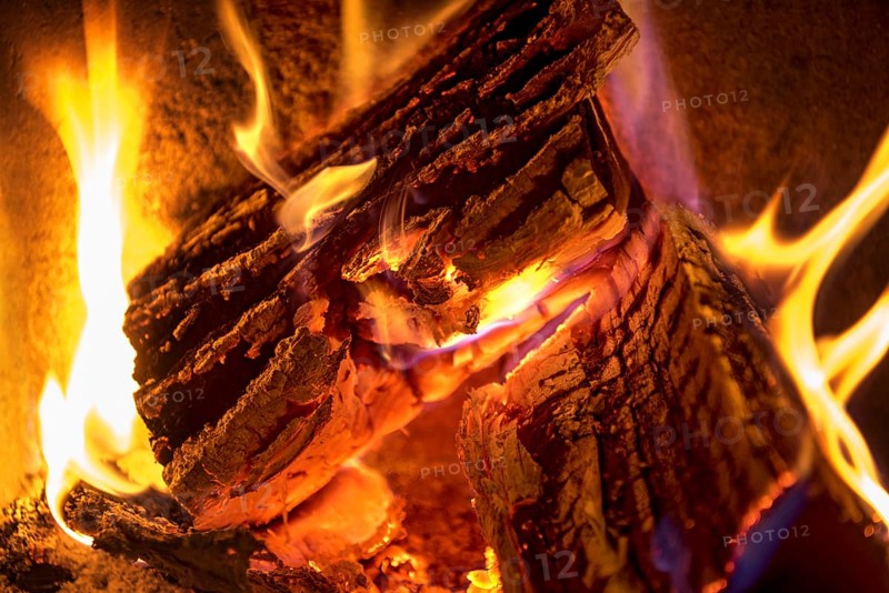 Burning log in the fireplace