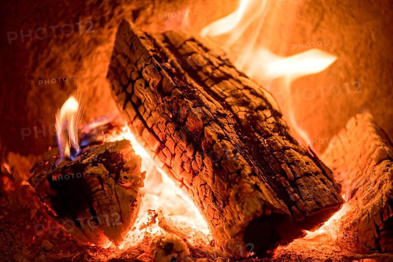 Burning log in the fireplace