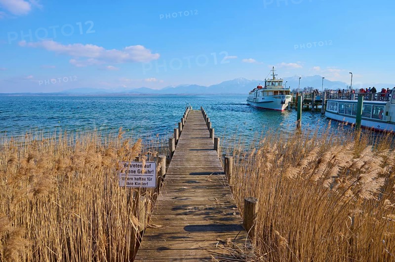 Lake Ciemsee wooden jetty and excursion boat