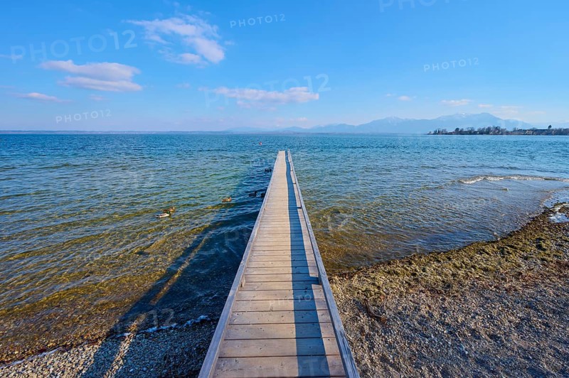 Lake Ciemsee with wooden jetty