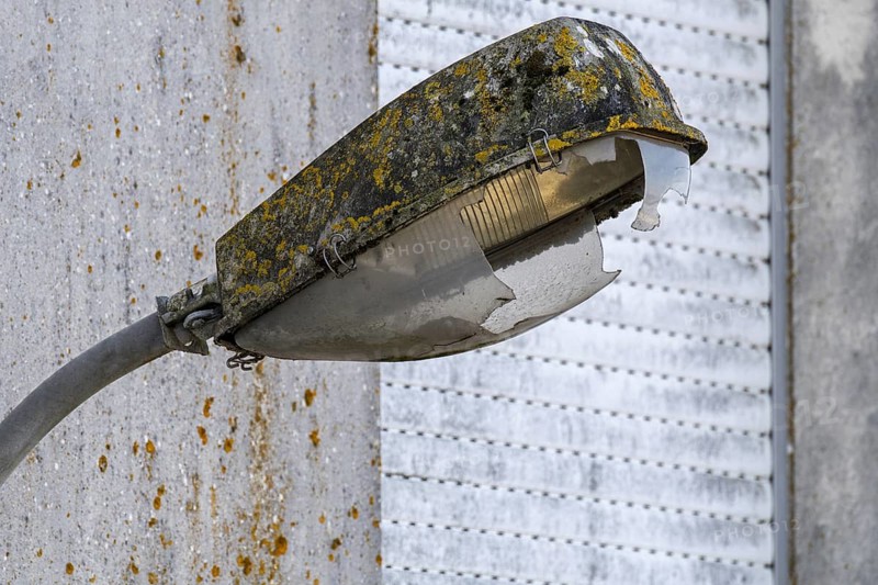 Old broken street lamp