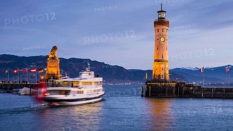 Harbour with lighthouse and Bavarian Lion