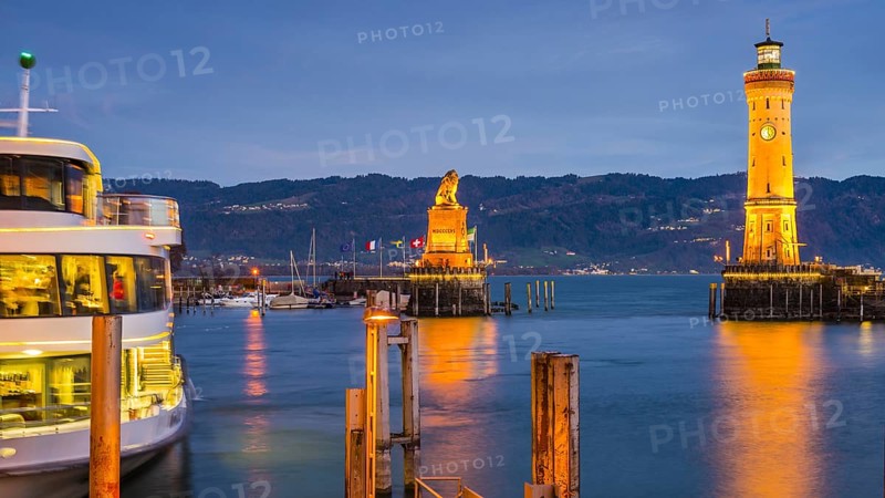 Harbour with lighthouse and Bavarian Lion