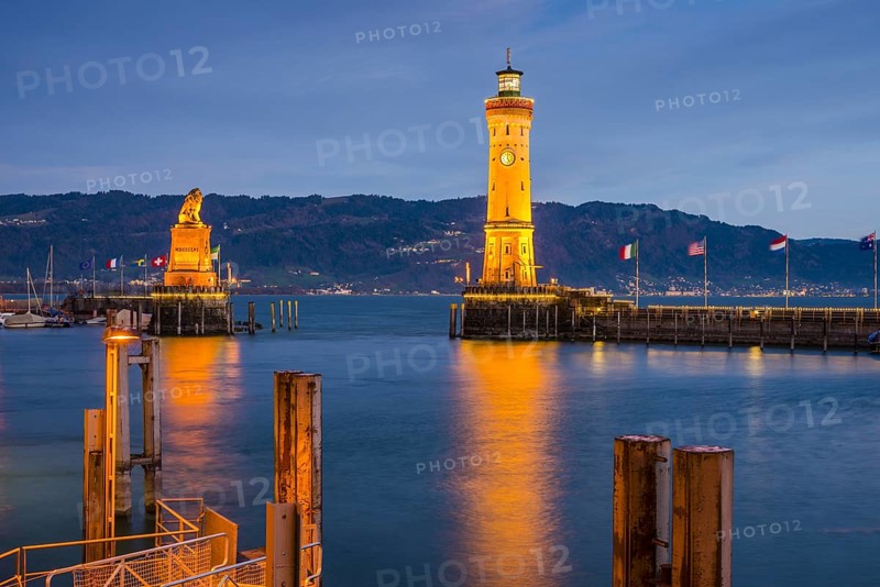Harbour with lighthouse and Bavarian Lion