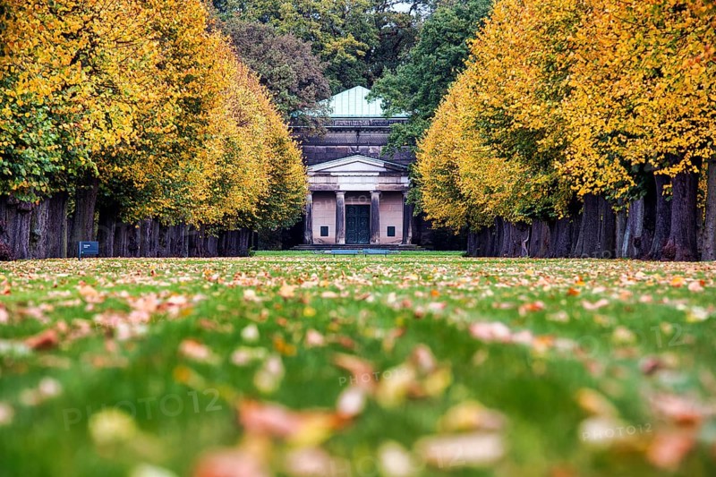 Autumn leaves in a meadow in front of the Guelph Mausoleum