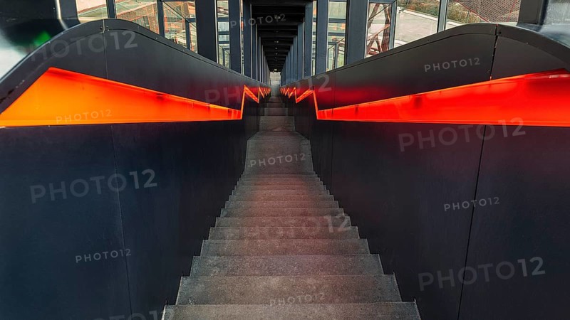 Dark illuminated staircase downwards