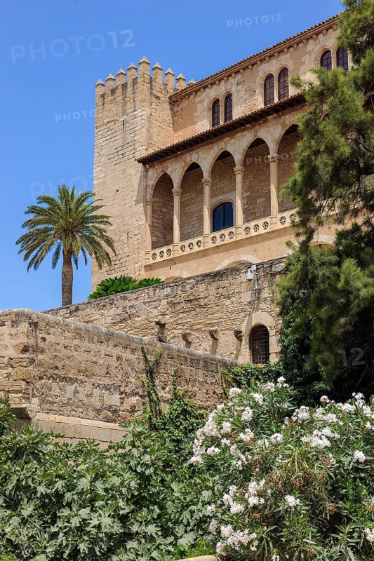 Tower and porch with arches in Andalusian style Archway of Alcazar Real Palazzo Reale dell Almudaina