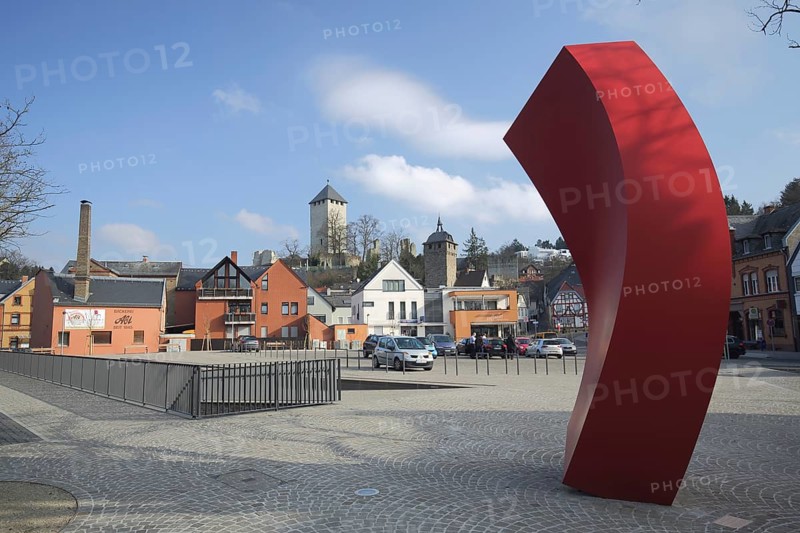Hofgartenplatz with sculpture A Piece of History Nina Stoelting and Gabor Toeroek 2015 and view of castle in Sonnenberg