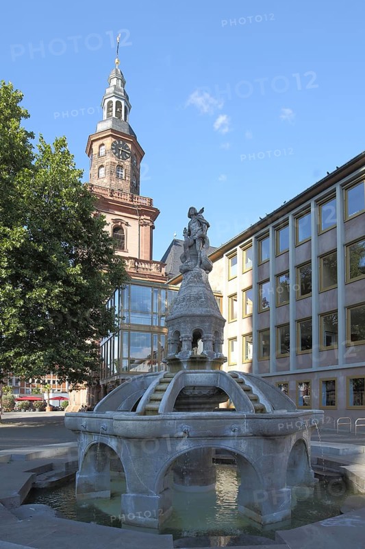 Siegfried Fountain on the Market Square and Tower of Holy Trinity Church