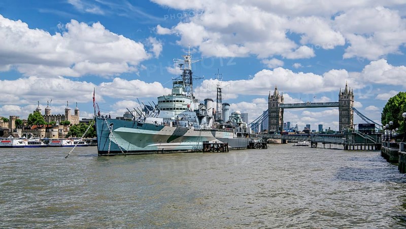 Museum Ship HMS Belfast on the Thames with Tower and Tower Bridge