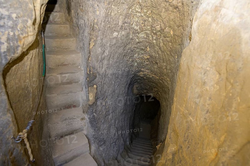 Staircase carved out of the sandstone inside the rock castle Valecov